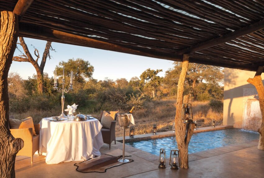 Outdoor dining alongside your private pool on your honeymoon suite verandah